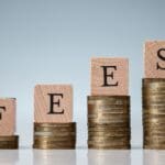 IRCC fees 2025 update chart showing changes for restoration, IEC, and inadmissibility services.